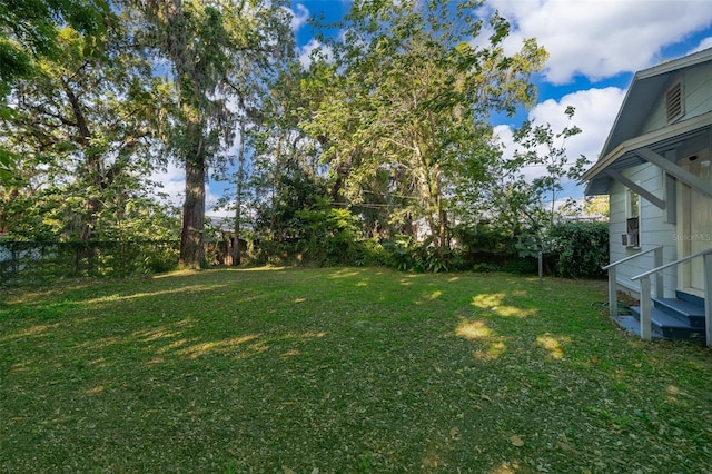 1204 34th St, Orlando, FL 32805 - view of yard featuring entry steps and fence