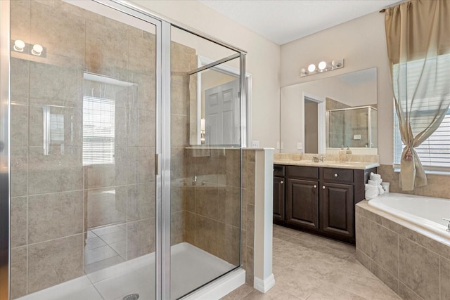 full bath with a shower stall, a garden tub, vanity, and a wealth of natural light