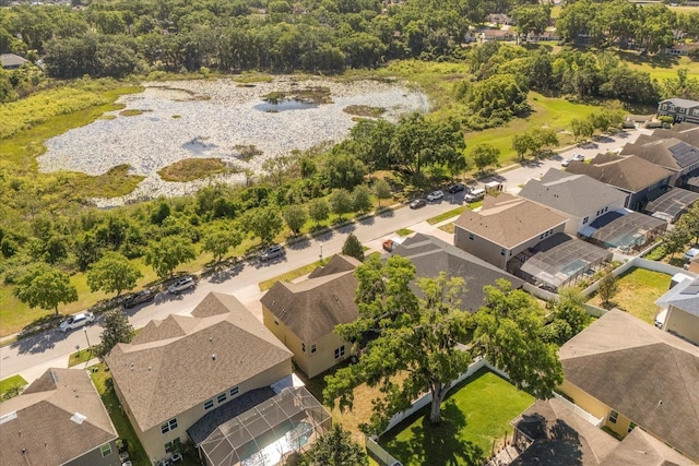 birds eye view of property with a residential view