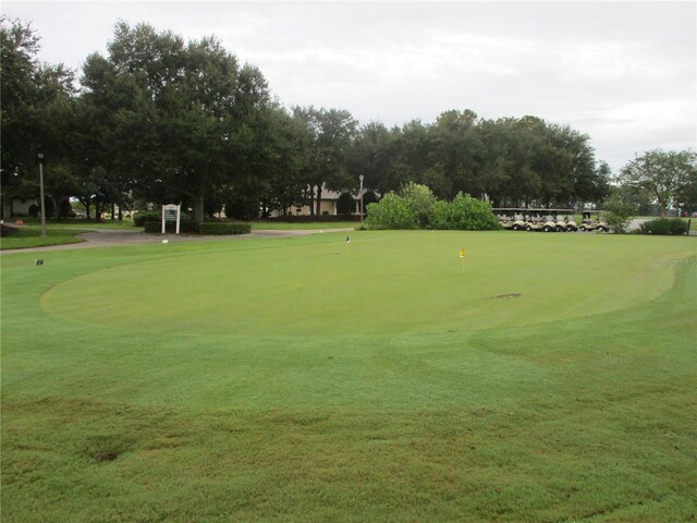 view of property's community with view of golf course