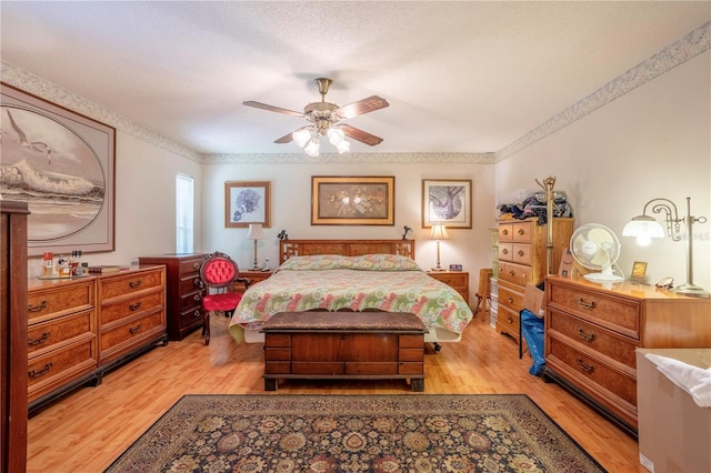 8 Trilby Br, Longwood, FL 32779 - bedroom with light wood-style flooring, a textured ceiling, ornamental molding, and ceiling fan