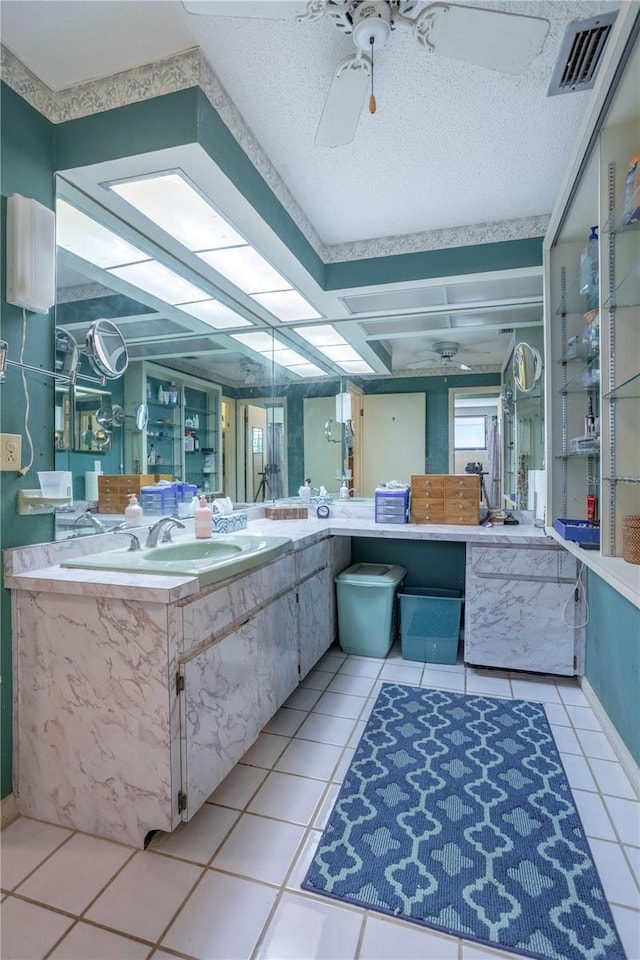 8 Trilby Br, Longwood, FL 32779 - full bathroom with ceiling fan, a textured ceiling, vanity, tile patterned flooring, and visible vents