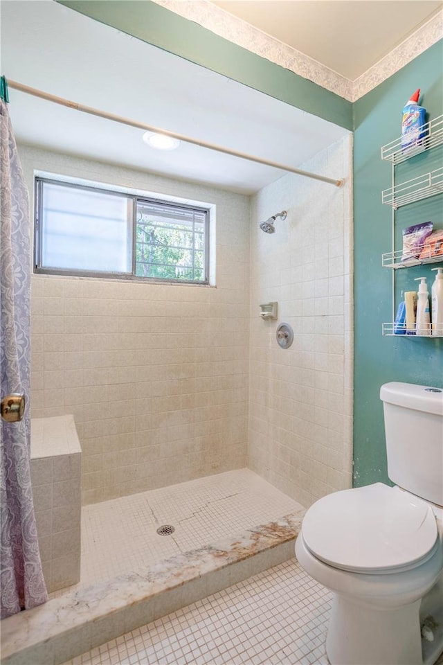 8 Trilby Br, Longwood, FL 32779 - full bath with toilet, tile patterned floors, and tiled shower