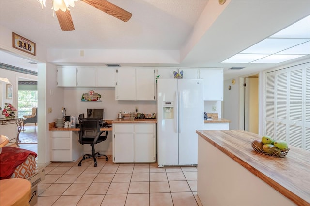 8 Trilby Br, Longwood, FL 32779 - kitchen featuring light tile patterned floors, light countertops, and white fridge with ice dispenser