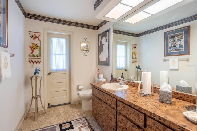 8 Trilby Br, Longwood, FL 32779 - bathroom featuring vanity, baseboards, crown molding, and toilet