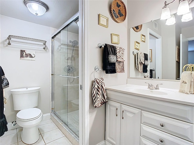 bathroom with toilet, a stall shower, tile patterned floors, and vanity