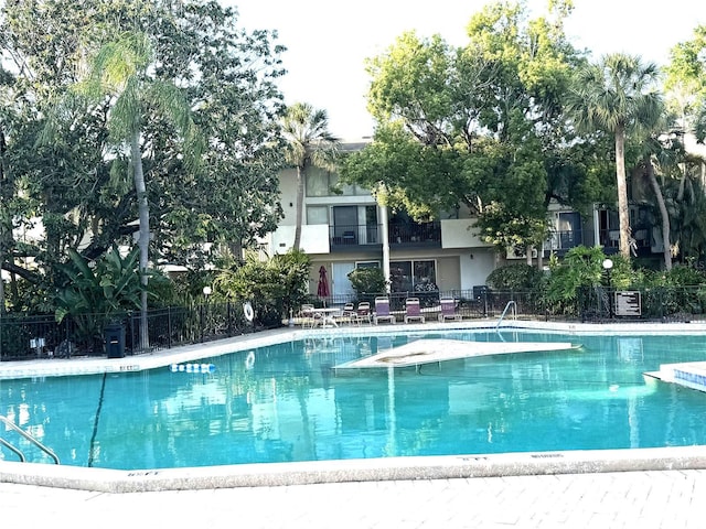 community pool with fence