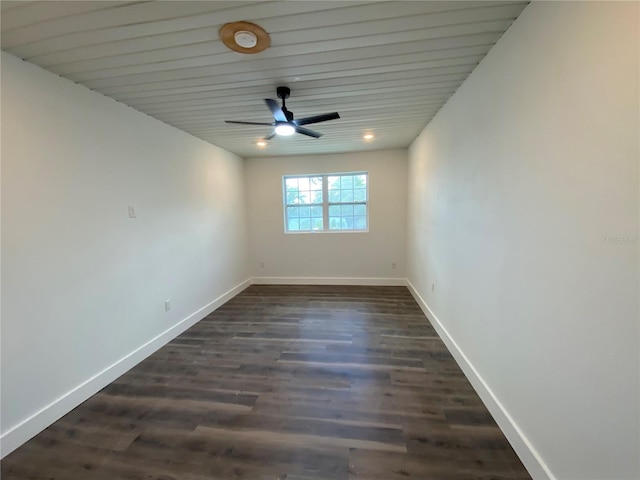545 Brooks Ct, Polk City, FL 33868 - unfurnished room with dark wood-style flooring, baseboards, and ceiling fan