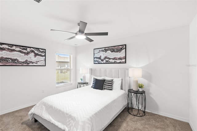 392 Kensington View Dr, Winter Haven, FL 33880 - bedroom with carpet floors, a ceiling fan, and baseboards