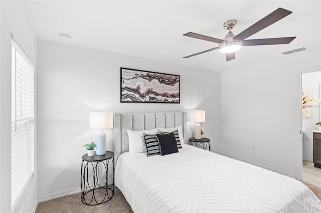 392 Kensington View Dr, Winter Haven, FL 33880 - bedroom with baseboards, a ceiling fan, visible vents, and connected bathroom