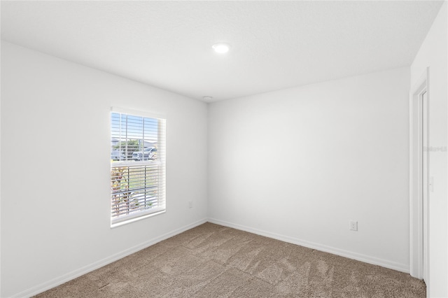392 Kensington View Dr, Winter Haven, FL 33880 - empty room with baseboards, carpet, and recessed lighting