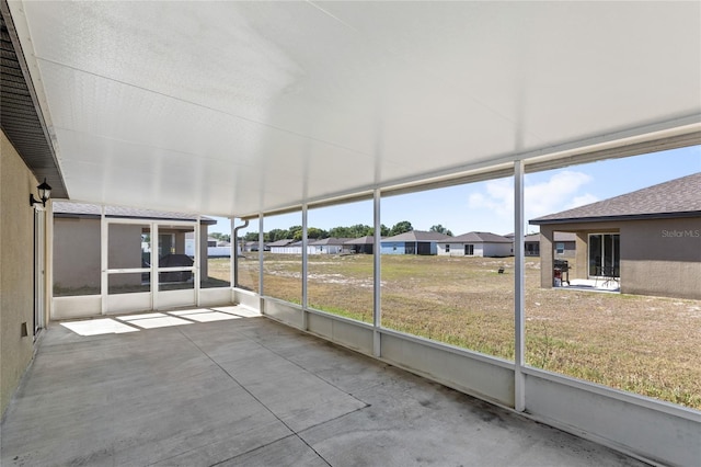 392 Kensington View Dr, Winter Haven, FL 33880 - unfurnished sunroom with a residential view