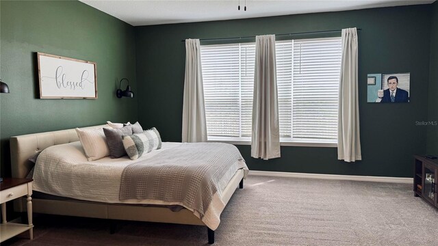 3330 Hanging Tide St, Winter Garden, FL 34787 - bedroom featuring baseboards and carpet