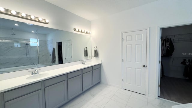 3330 Hanging Tide St, Winter Garden, FL 34787 - full bath featuring marble finish floor, walk in shower, a sink, and double vanity