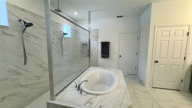3330 Hanging Tide St, Winter Garden, FL 34787 - bathroom with visible vents, a garden tub, a marble finish shower, and marble finish floor