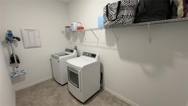3330 Hanging Tide St, Winter Garden, FL 34787 - washroom featuring washing machine and dryer, baseboards, and laundry area