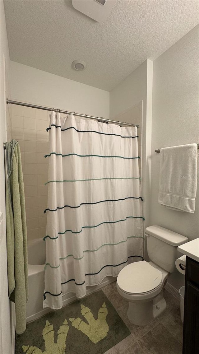 3330 Hanging Tide St, Winter Garden, FL 34787 - bathroom with toilet, vanity, a textured ceiling, and shower / bath combo with shower curtain