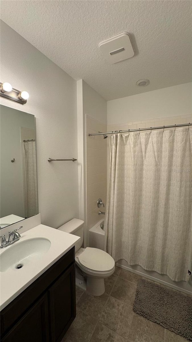 3330 Hanging Tide St, Winter Garden, FL 34787 - bathroom featuring shower / bath combo, toilet, vanity, and a textured ceiling