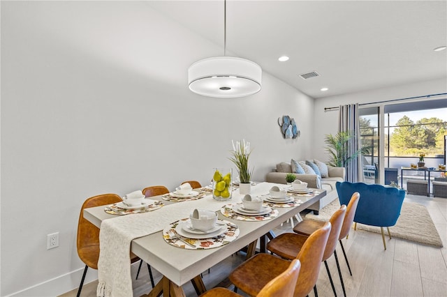 dining space featuring recessed lighting, baseboards, visible vents, and light wood-type flooring