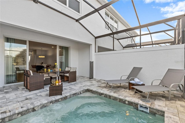 view of patio / terrace with outdoor lounge area and an outdoor pool