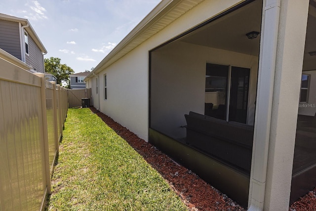4012 Meandering Bay Dr, Apopka, FL 32712 - view of property exterior featuring central AC and stucco siding
