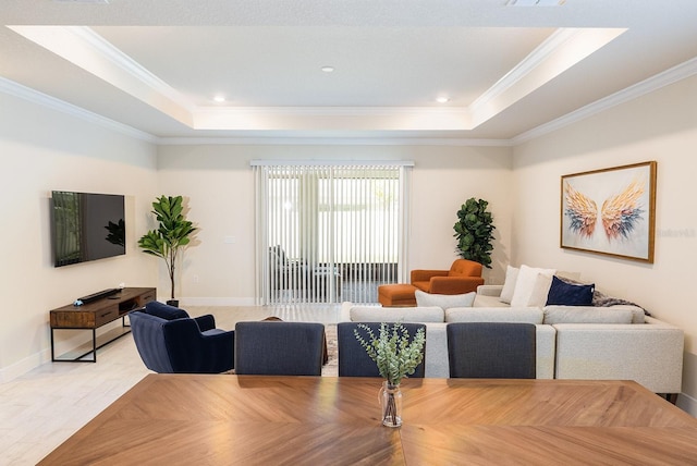 4012 Meandering Bay Dr, Apopka, FL 32712 - living room featuring a tray ceiling, ornamental molding, light wood-type flooring, baseboards, and recessed lighting