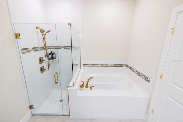 4012 Meandering Bay Dr, Apopka, FL 32712 - bathroom featuring a garden tub and a shower stall