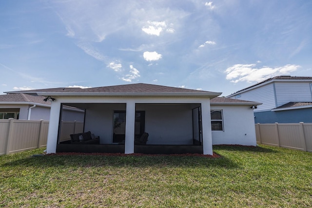 4012 Meandering Bay Dr, Apopka, FL 32712 - back of house with a sunroom and stucco siding
