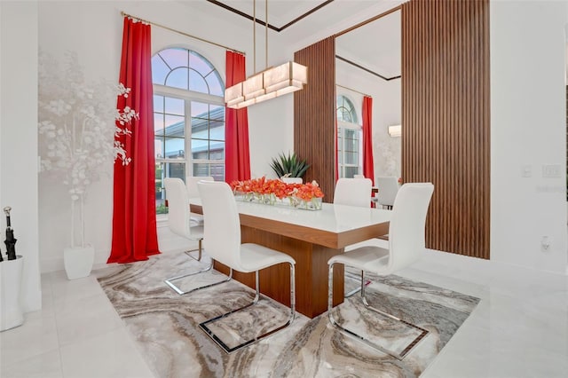 dining space featuring tile patterned flooring