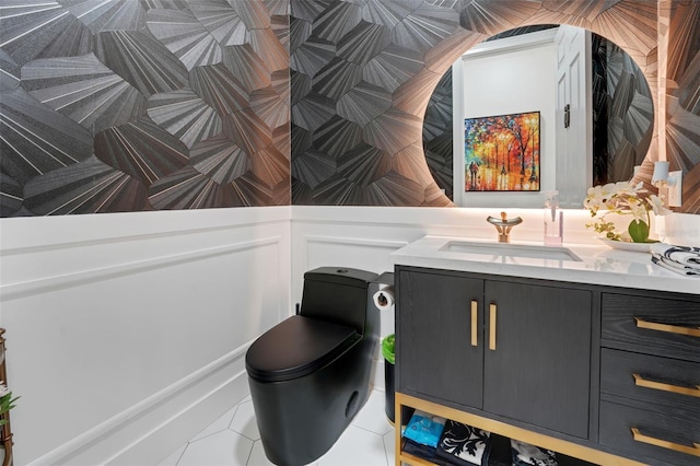 bathroom featuring tile patterned floors, vanity, and toilet