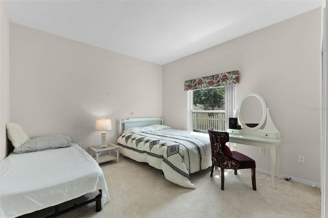 219 Strathmore Cir, Kissimmee, FL 34744 - carpeted bedroom with baseboards