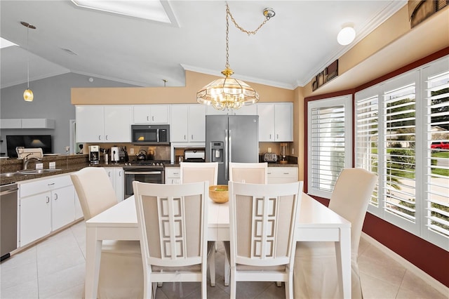 26901 Racquet Cir, Leesburg, FL 34748 - dining area with lofted ceiling, light tile patterned floors, and a notable chandelier