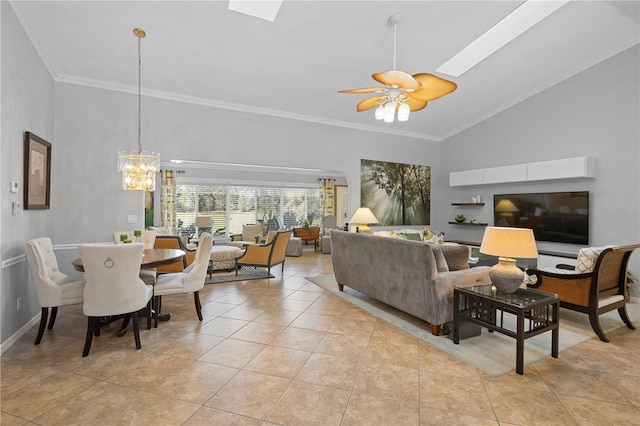 26901 Racquet Cir, Leesburg, FL 34748 - living room featuring a skylight, ceiling fan with notable chandelier, high vaulted ceiling, light tile patterned flooring, and crown molding