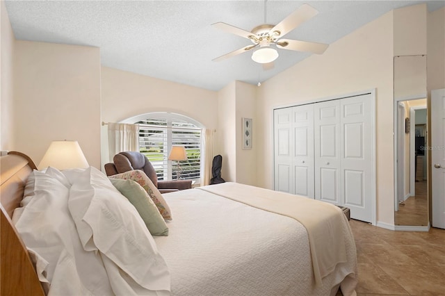 26901 Racquet Cir, Leesburg, FL 34748 - bedroom with baseboards, ceiling fan, a closet, and lofted ceiling