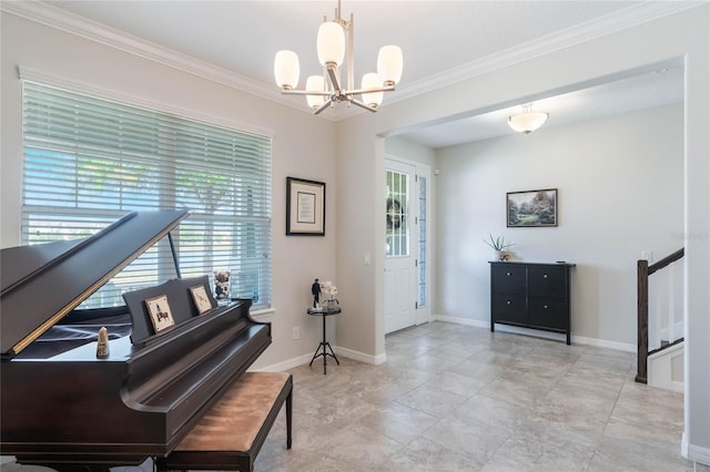 living area featuring baseboards, ornamental molding, and a chandelier