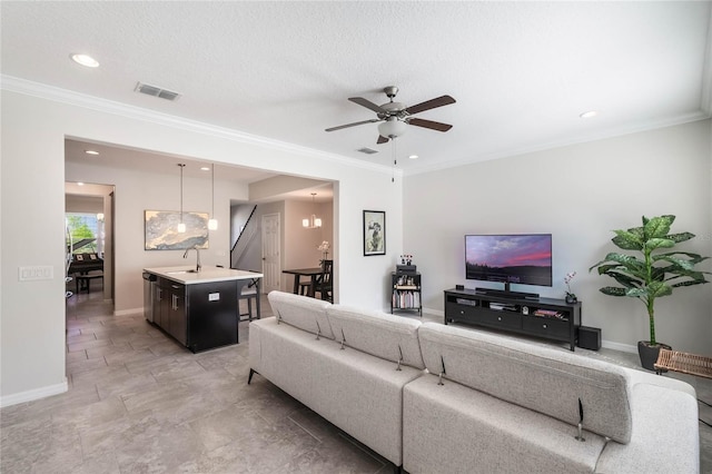 living room featuring ceiling fan, ornamental molding, recessed lighting, and visible vents