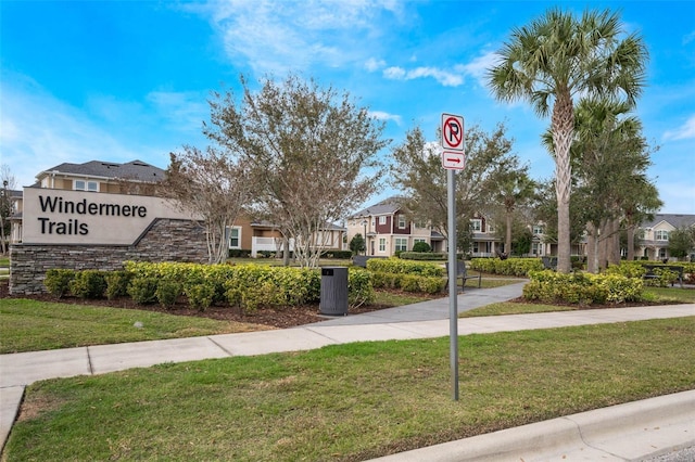exterior space featuring a yard and a residential view