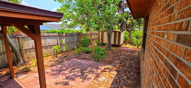 6277 Cranberry Ln W, Jacksonville, FL 32244 - fenced backyard featuring a patio