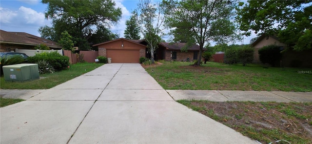 6277 Cranberry Ln W, Jacksonville, FL 32244 - ranch-style house with a garage and concrete driveway