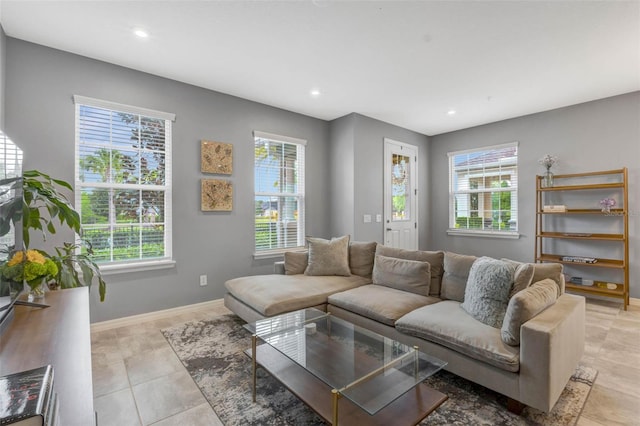 9433 Randal Park Blvd, Orlando, FL 32832 - living room with recessed lighting, plenty of natural light, and baseboards