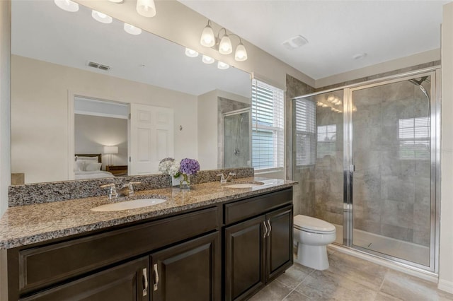 9433 Randal Park Blvd, Orlando, FL 32832 - ensuite bathroom featuring a sink, visible vents, connected bathroom, and a stall shower