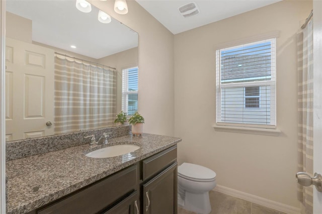 9433 Randal Park Blvd, Orlando, FL 32832 - full bath featuring visible vents, baseboards, a shower with shower curtain, toilet, and vanity