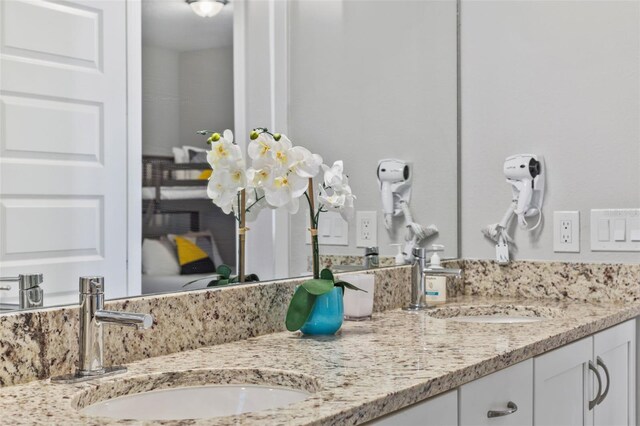 7759 Westland Dr, Kissimmee, FL 34747 - interior details with double vanity and a sink