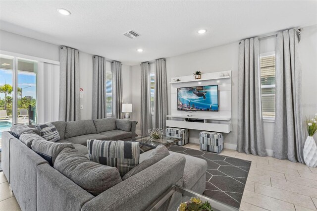 7759 Westland Dr, Kissimmee, FL 34747 - living area with visible vents and recessed lighting