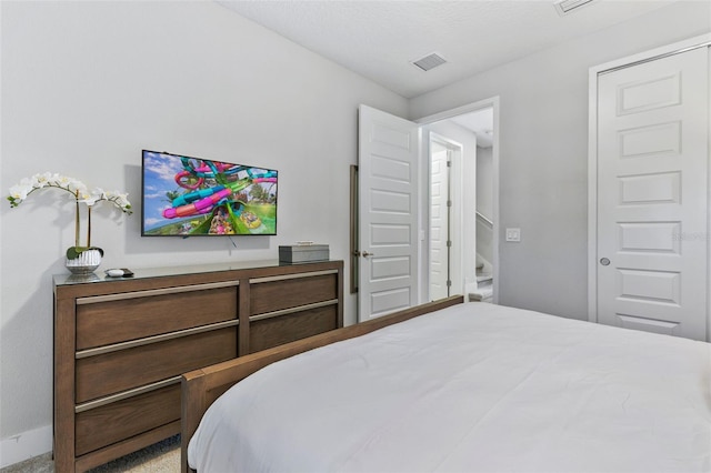 7759 Westland Dr, Kissimmee, FL 34747 - bedroom featuring visible vents and baseboards