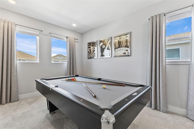 7759 Westland Dr, Kissimmee, FL 34747 - recreation room with recessed lighting, baseboards, carpet flooring, and plenty of natural light