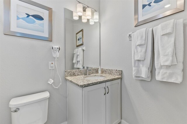 7759 Westland Dr, Kissimmee, FL 34747 - bathroom with toilet and vanity