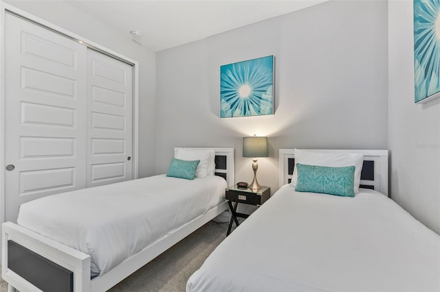 7759 Westland Dr, Kissimmee, FL 34747 - bedroom featuring a closet and carpet