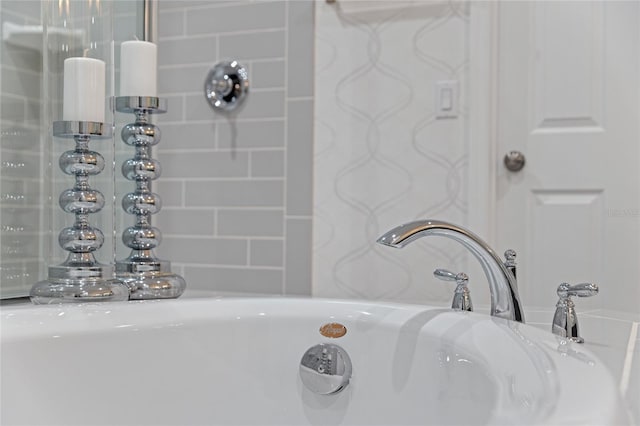 full bath with a sink and a tub
