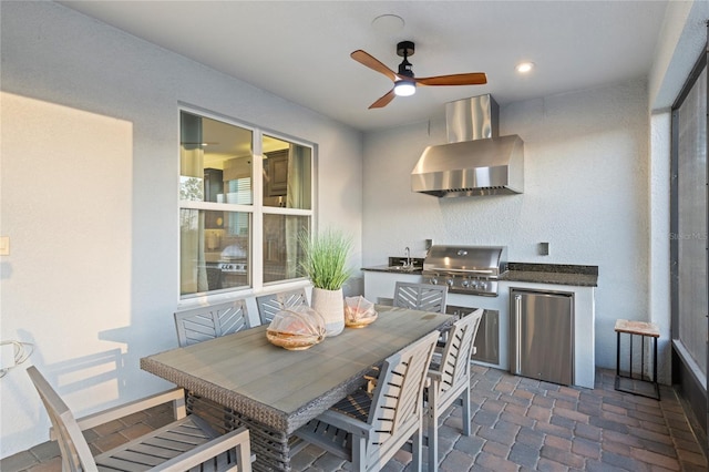 dining room with brick floor and a ceiling fan